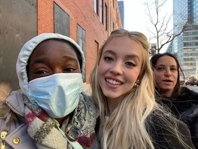 sydney sweeney with a fan