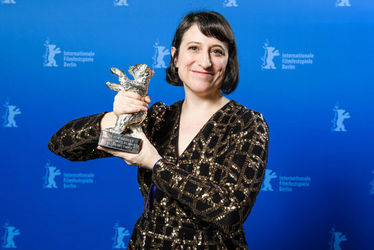 Eliza+Hittman+poses+with+the+Silver+Bear+Grand+Jury+Prize+for+the+film+Never+Rarely+Sometimes+Always+after+the+award+ceremony+of+the+70th+Berlinale+International+Fi