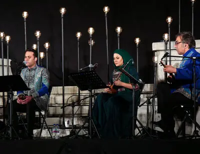 ساز و آواز در فضای باز کاخ نیاوان/گزارش تصویری از کنسرت متبسم و تاج