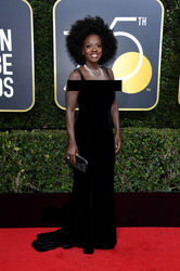 Viola Davis in a gown channelling John Singer Sargent’s Madame X by way of Studio 54. Win
