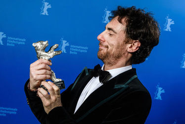 Elio+Germano+with+the+Silver+Bear+for+Best+Actor+for+the+film+Hidden+Away+after+the+award+ceremony+of+the+70th+Berlinale+International+Film+Festival+Berlin+at+Grand