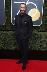 Joseph Fiennes shows his support for the black dress code_ adding his