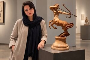 Shadi Habib and Her Wooden Sculpture CENTAUR , Selected for the 10th Annual International Art Competition at Contemporary Art Gallery Online