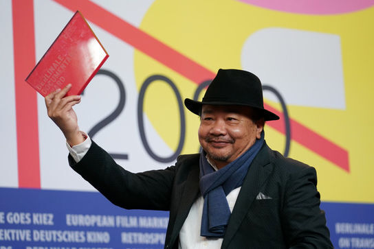 Rithy+Panh+winner+of+the+Berlinale+Documentary+Award+for+the+film+Irradiated+speaks+at+the+award+winners+press+conference+during+the+70th+Berlinale+International+Fi