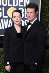 The Crown’s Claire Foy and Matt Smith match tuxedos.