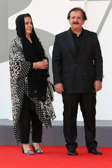 02+Director+Majid+Majidi+and+a+guest+walk+the+red+carpet+ahead+of+the+movie+Khorshid+(Sun+Children)+at+the+77th+Venice+Film+Festival+on+September+06_+2020+in+Venice_+Italy.1